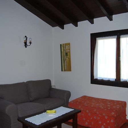 Apartamentos El Perujo Комильяс Экстерьер фото