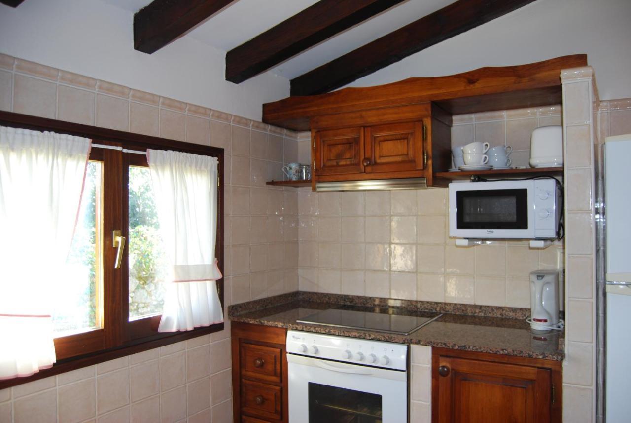 Apartamentos El Perujo Комильяс Экстерьер фото
