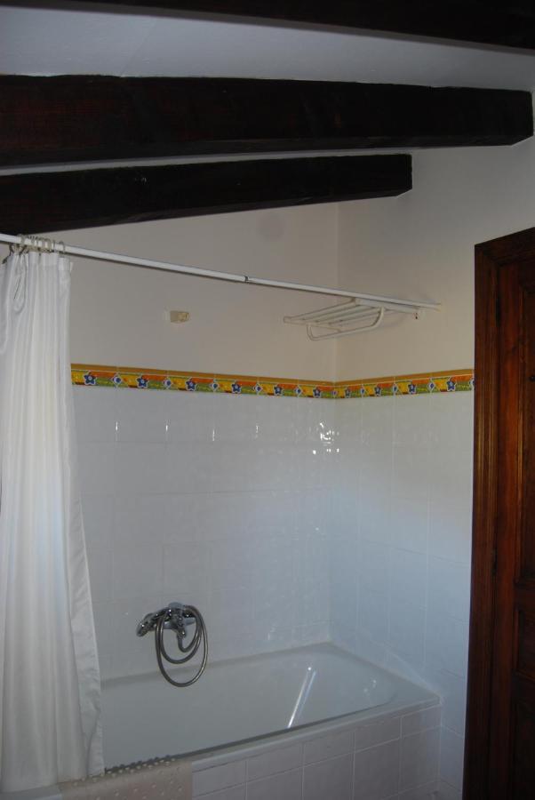 Apartamentos El Perujo Комильяс Экстерьер фото